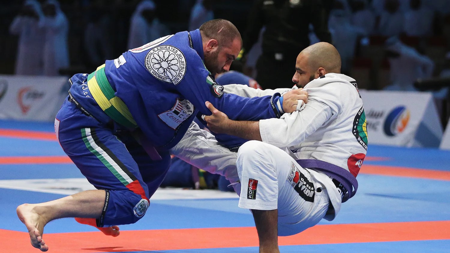 Two men grappling in a Brazilian Jiu-Jitsu match